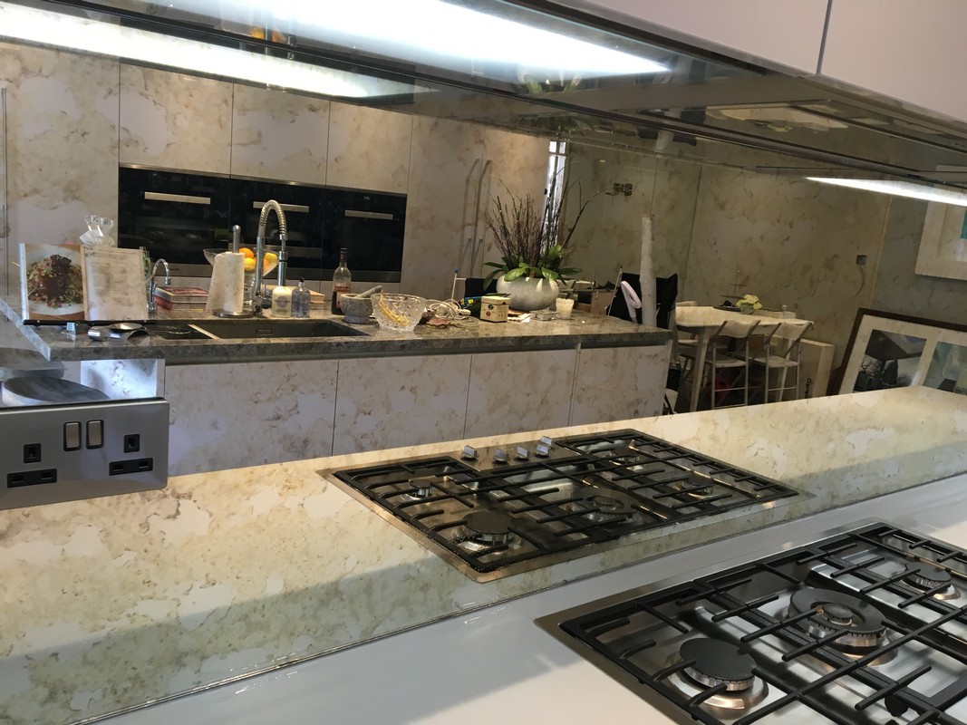 Mirror glass splashback in Tring luxury kitchen