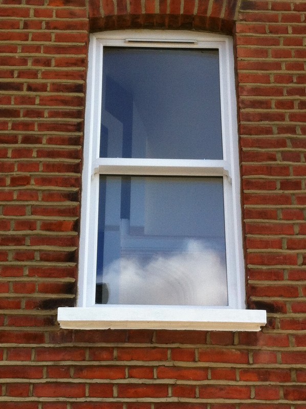 uPVC sash window on Victorian red brick house in Tring